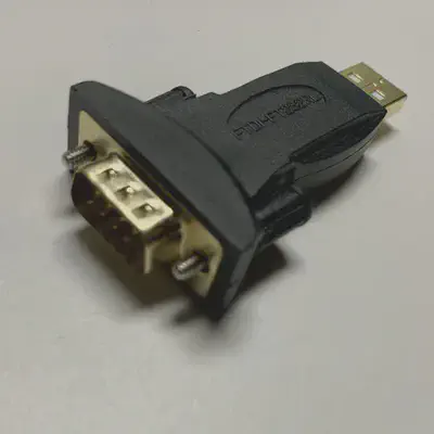 A USB adapter with a USB type-A connector on one side and a male DE-9 serial connector on the other side.